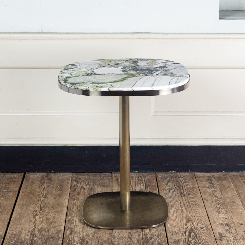 Brushed steel and marble restaurant tables,