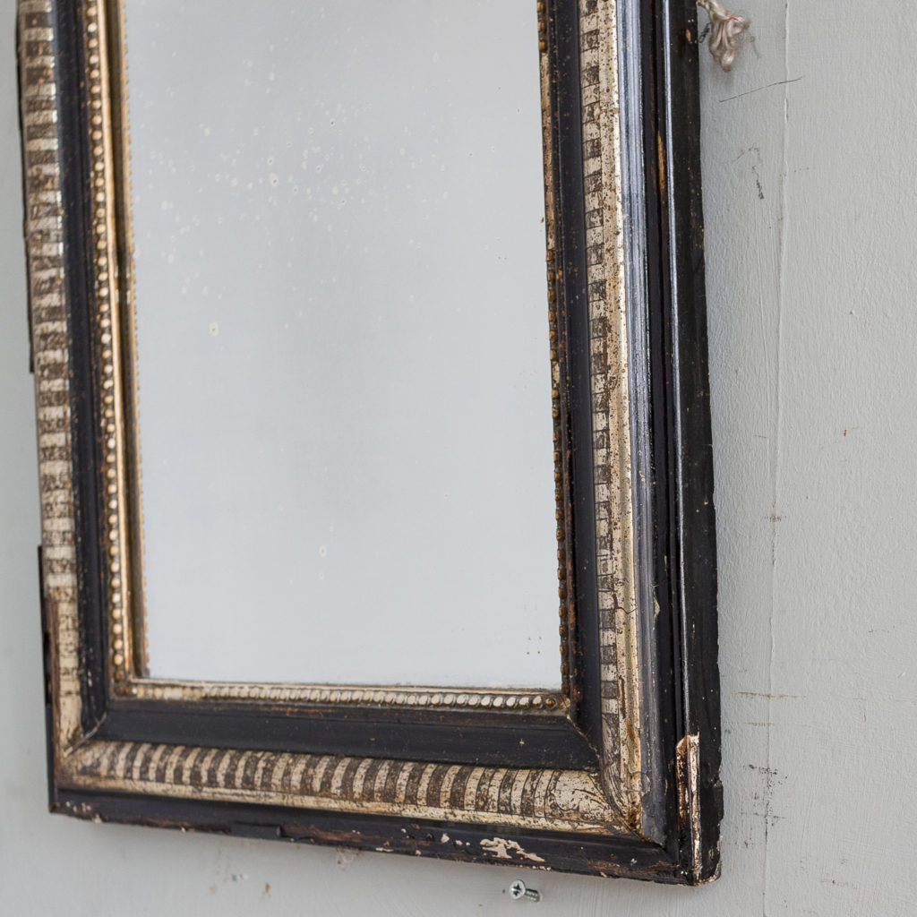 French ebonised and parcel silver-gilt wall mirror,-139998