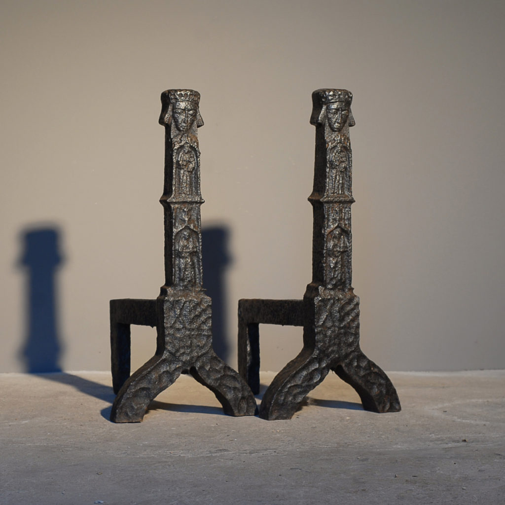 A substantial pair of cast iron andirons-0