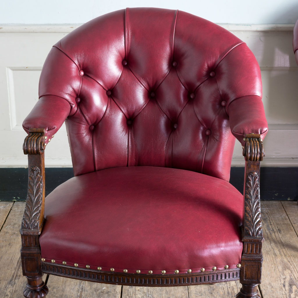 traditionally upholstered in the finest red goatskin and finished with brass tacks.