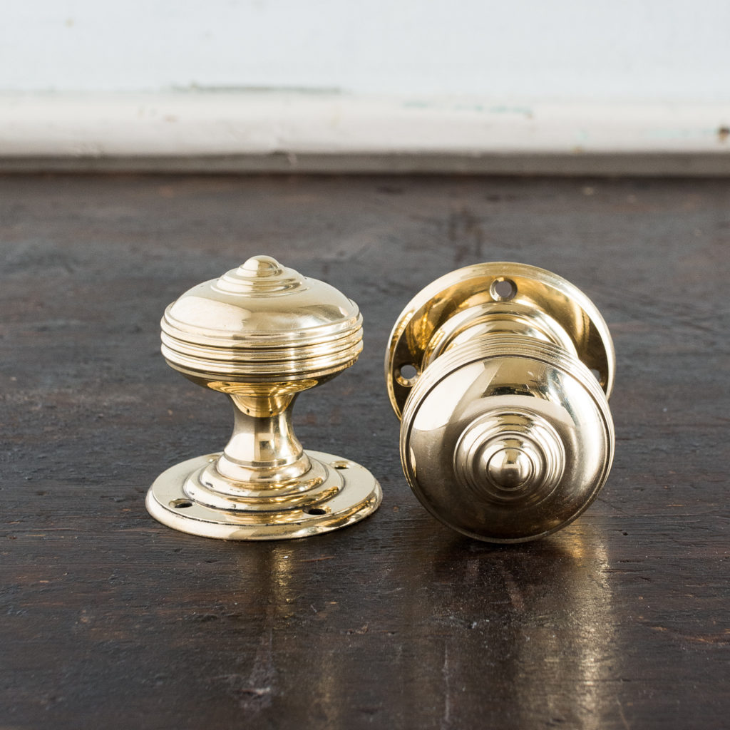 Brass Georgian style circular door knobs