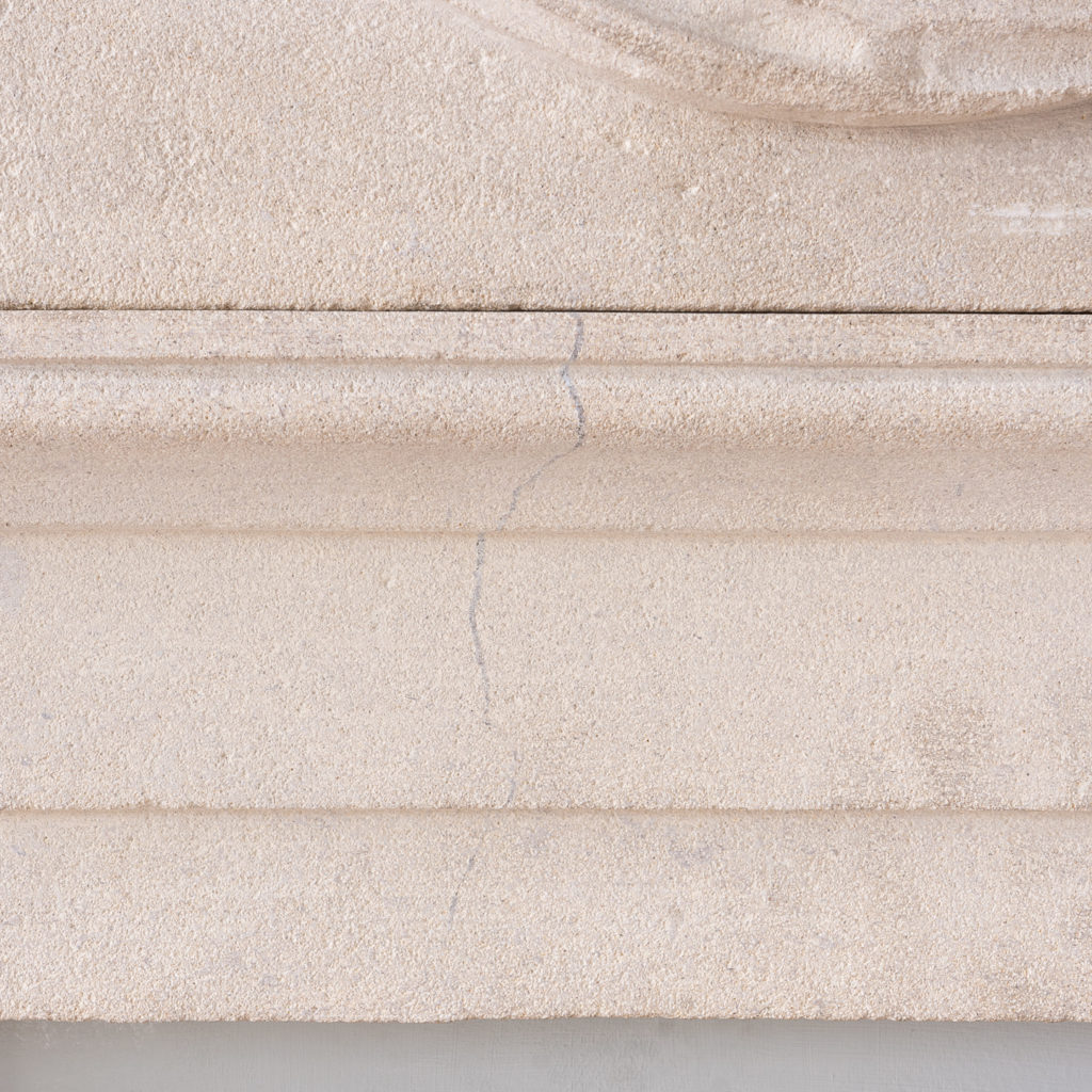 George II style limestone fireplace