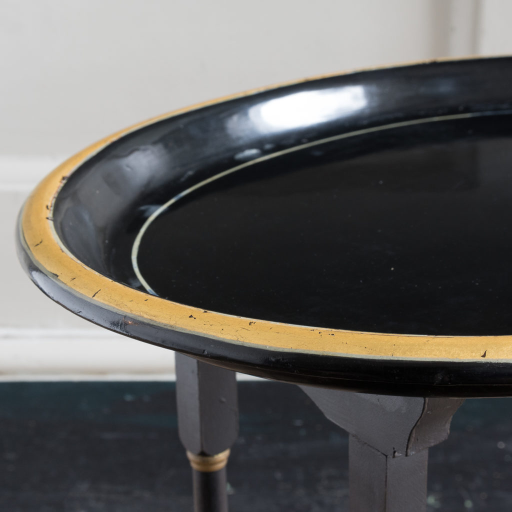 Victorian style ebonised and parcel-gilt tray top table