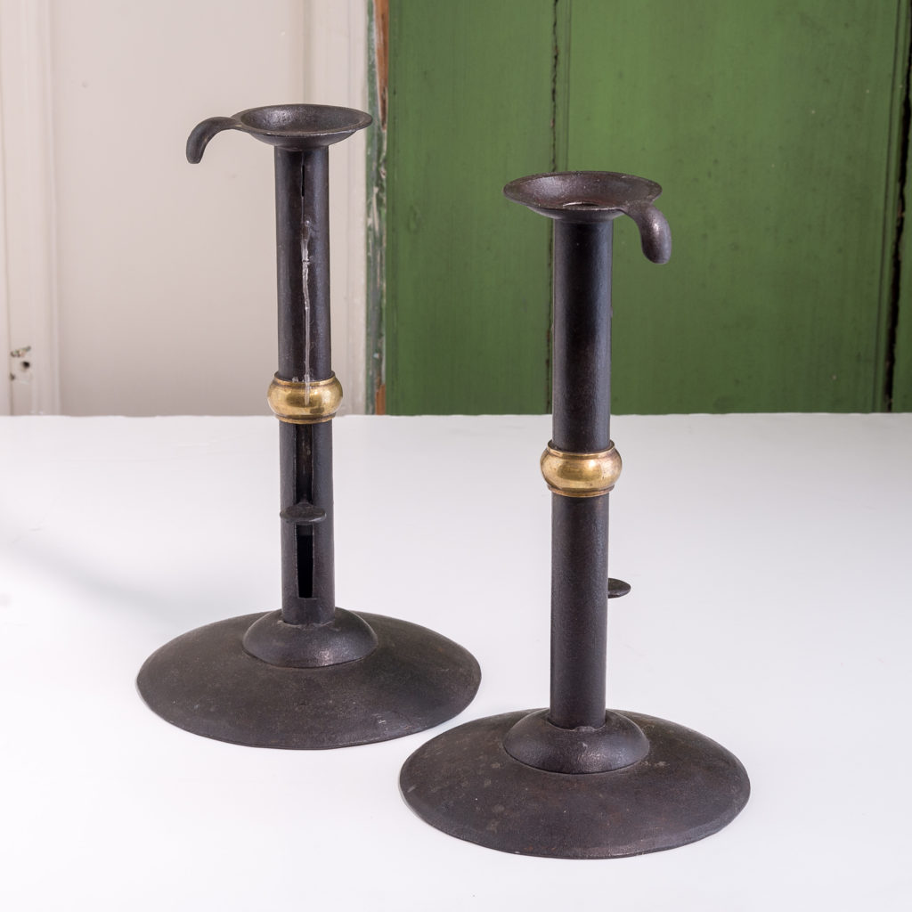 Sheet iron and brass collared hog scrapper candlesticks