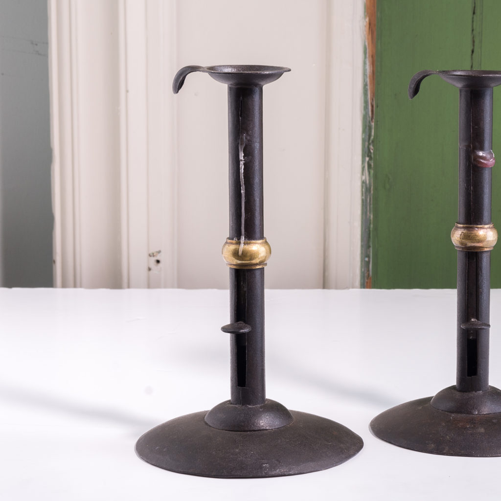 Sheet iron and brass collared hog scrapper candlesticks