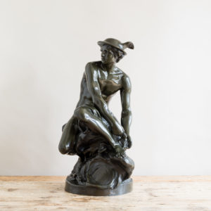 Bronze modelled on a seated Mercury by Jean-Baptiste Pigalle