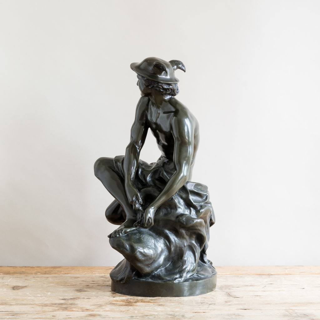 Bronze modelled on a seated Mercury by Jean-Baptiste Pigalle
