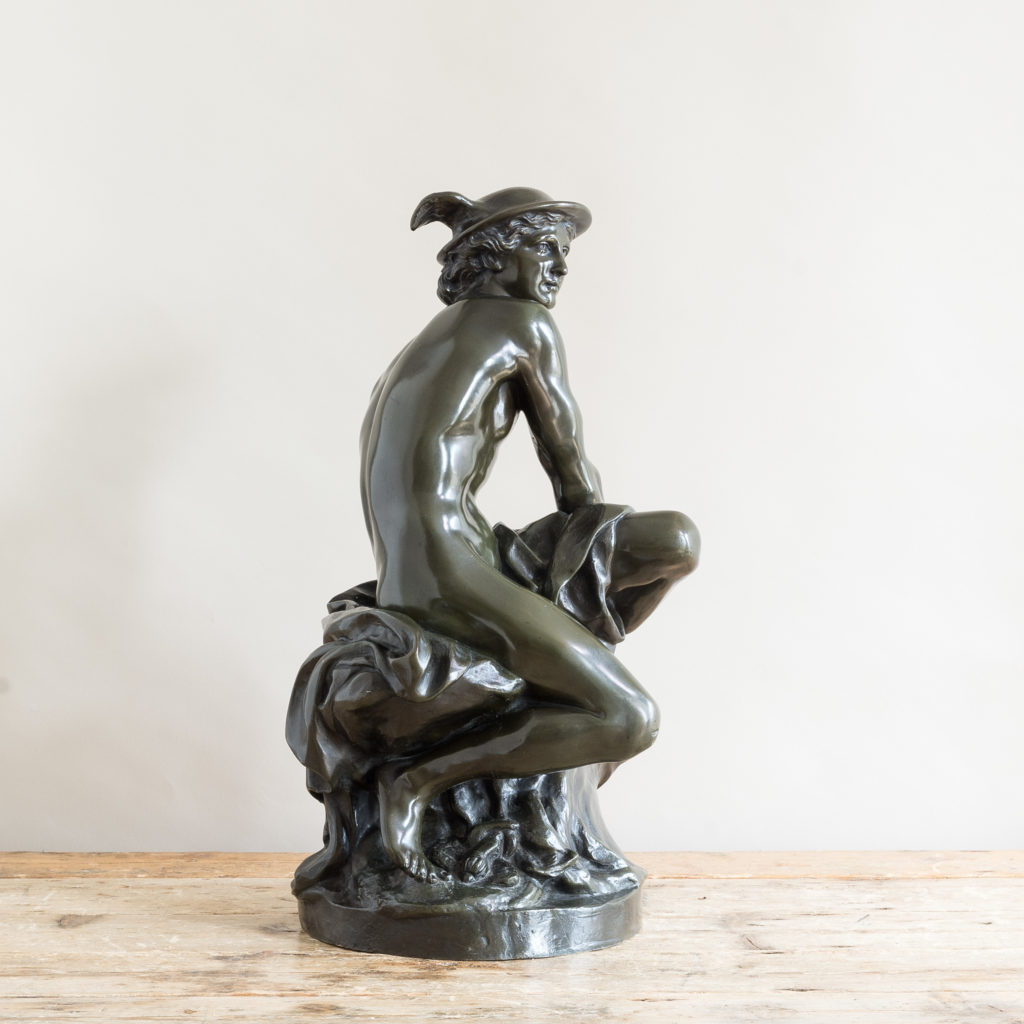 Bronze modelled on a seated Mercury by Jean-Baptiste Pigalle