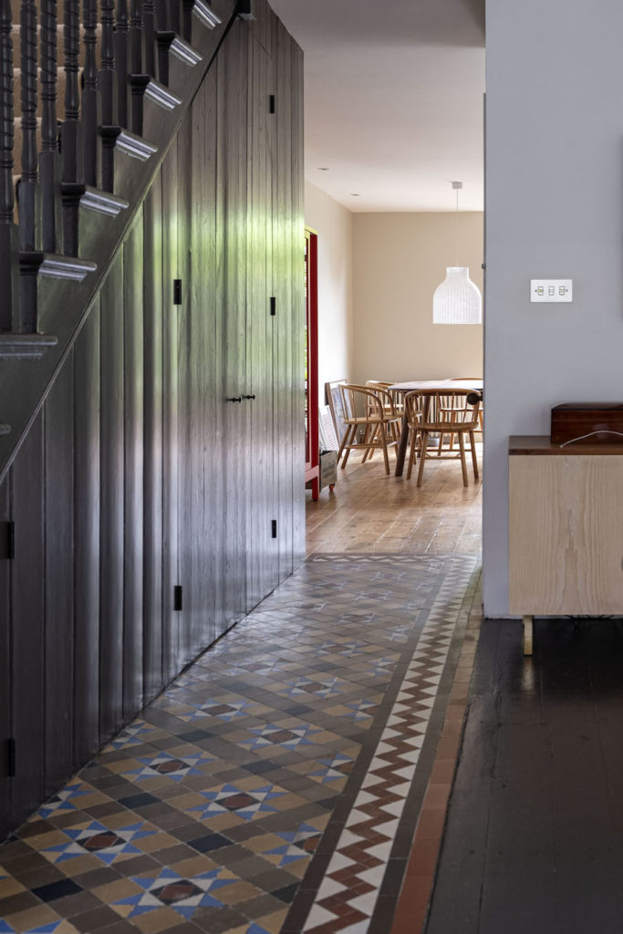 hallway with matchboard pine cladding