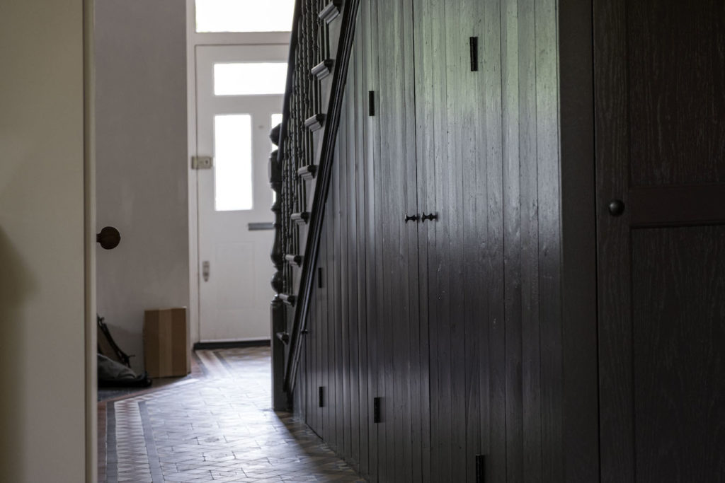 hallway with matchboard pine cladding