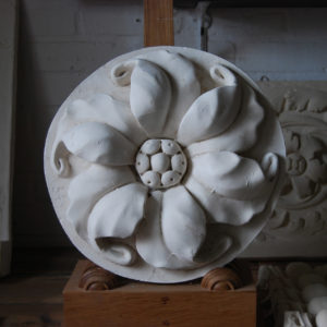 plaster flowerhead roundel plaque