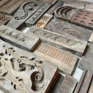 A small collection of Victorian carved wooden framemaker's moulds