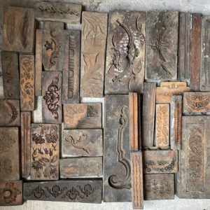 A small collection of Victorian carved wooden framemaker's moulds