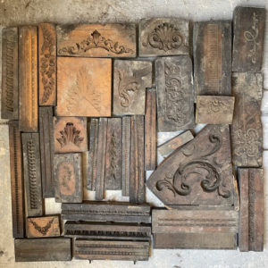 A small collection of Victorian carved wooden framemaker's moulds