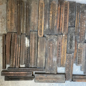 A small collection of Victorian carved wooden framemaker's moulds