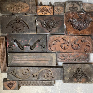 A small collection of Victorian carved wooden framemaker's moulds