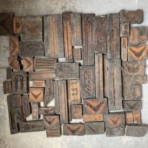 A small collection of Victorian carved wooden framemaker's moulds