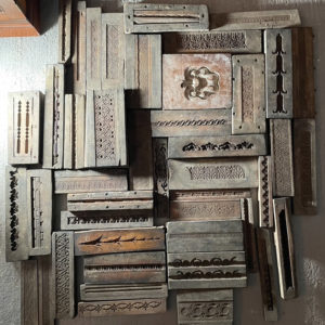 A small collection of Victorian carved wooden framemaker's moulds