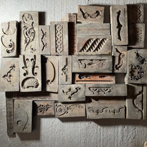 A small collection of Victorian carved wooden framemaker's moulds