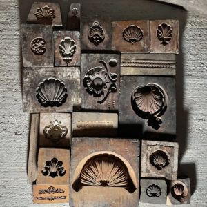 A small collection of Victorian carved wooden framemaker's moulds