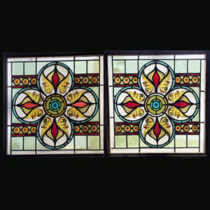 Pair of quatrefoil stained glass windows