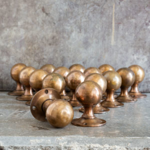 Set of patinated reclaimed door knobs