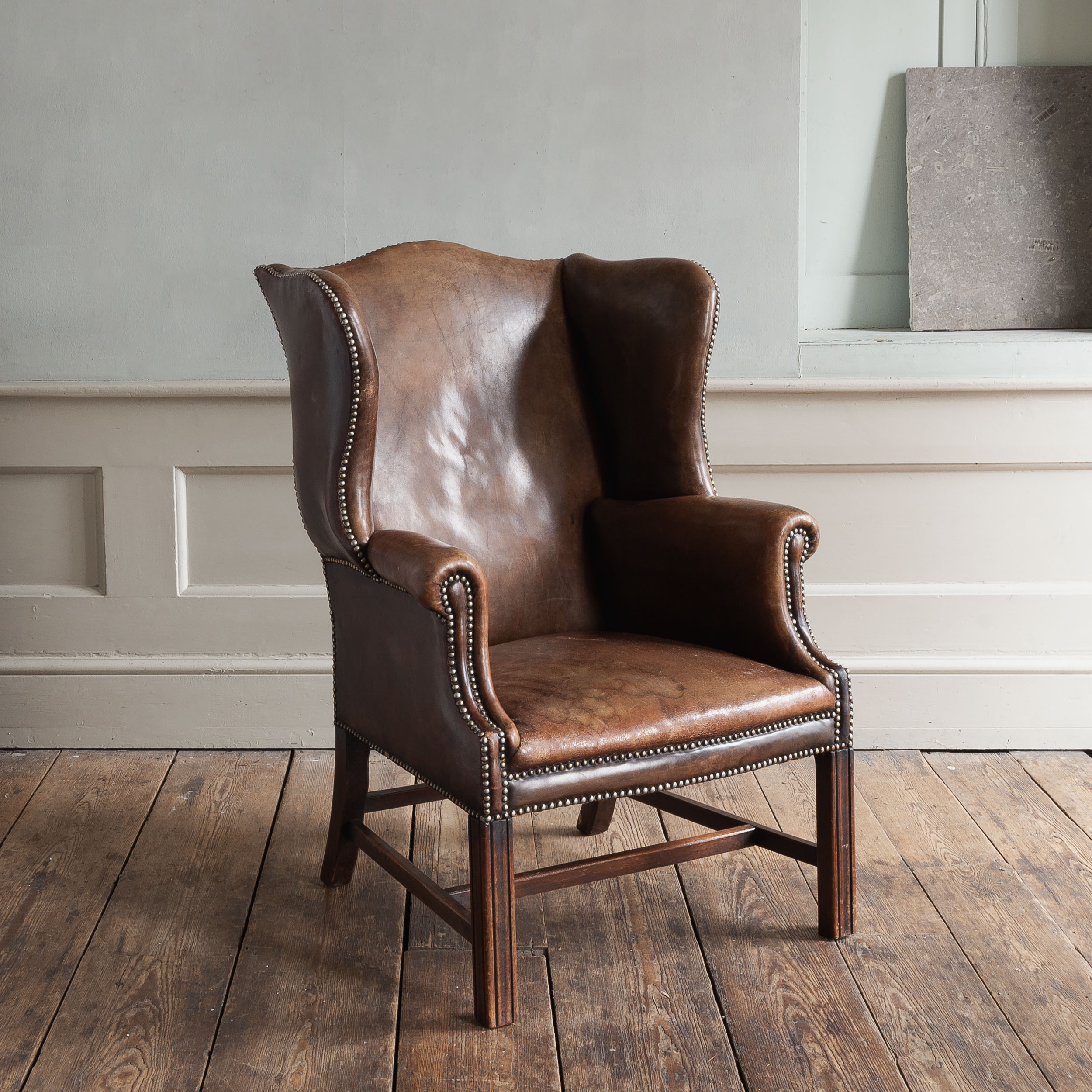 Brown leather wingback armchair discount