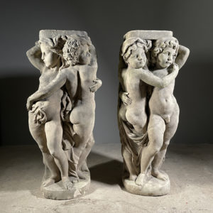 carved stone putti